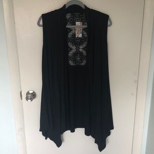 Women’s small black shrug/wrap.